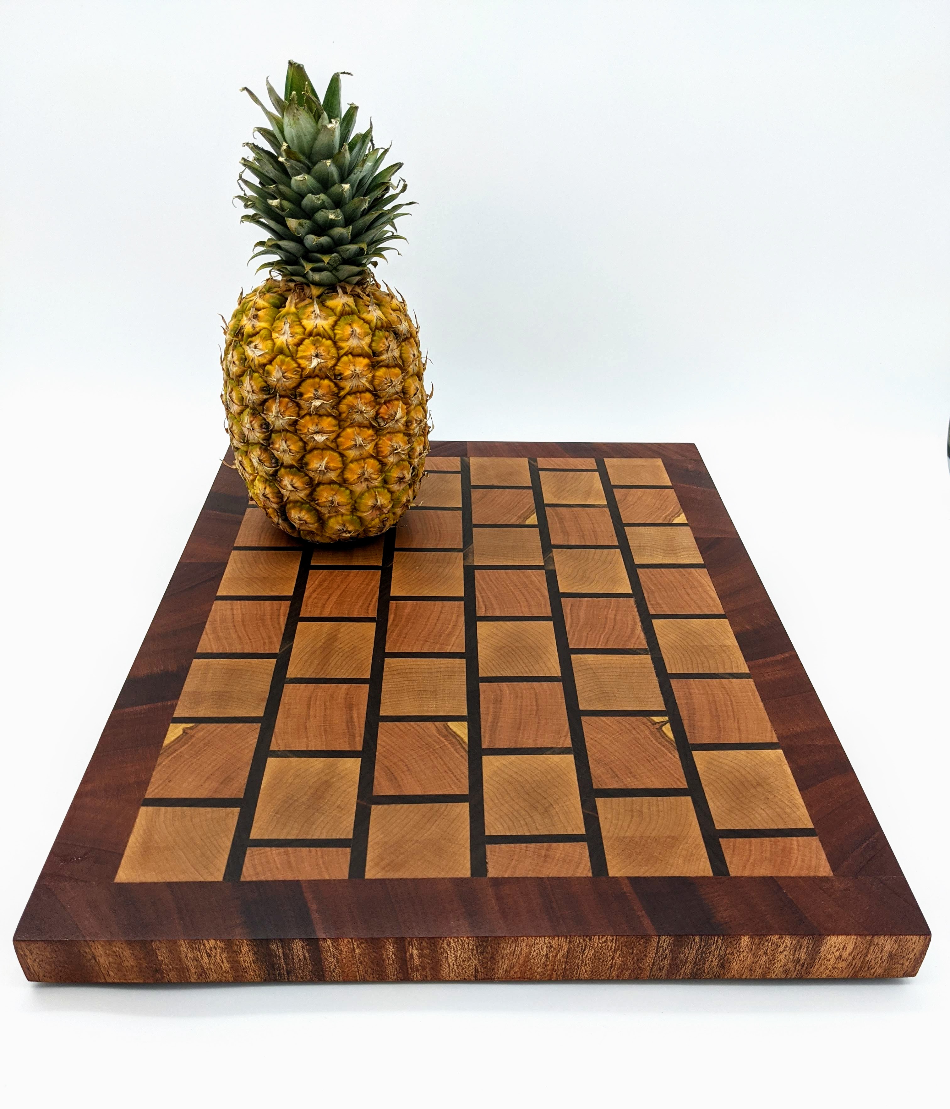 End grain chopping block with a brick and mortar pattern