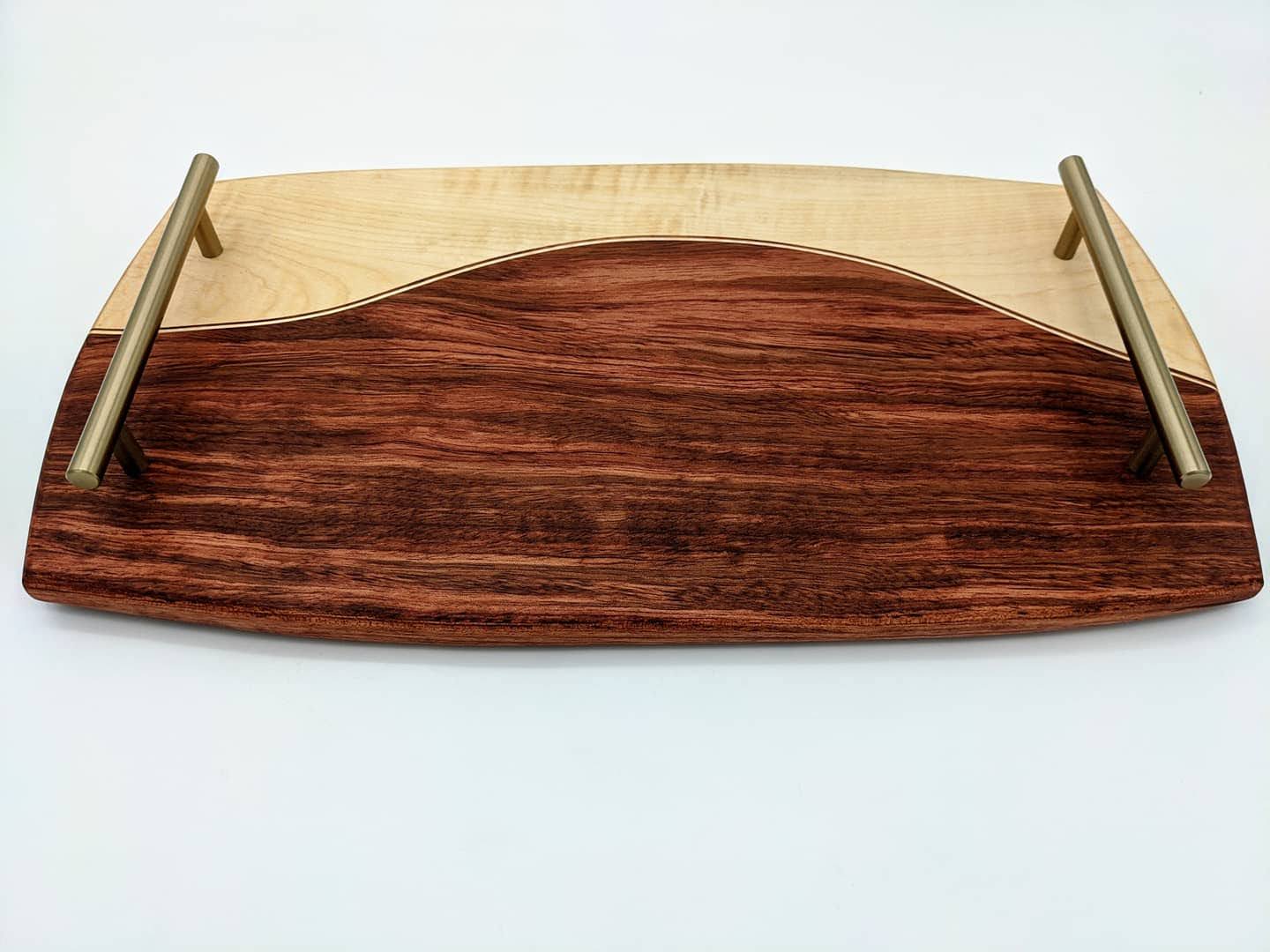 Bubinga and maple charcuterie board with brass hardware